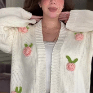 White Knit Cardigan with Pink Floral Appliqué 🌸🤍 – Button-Up Layer Styled with Gold Necklaces & Light Denim